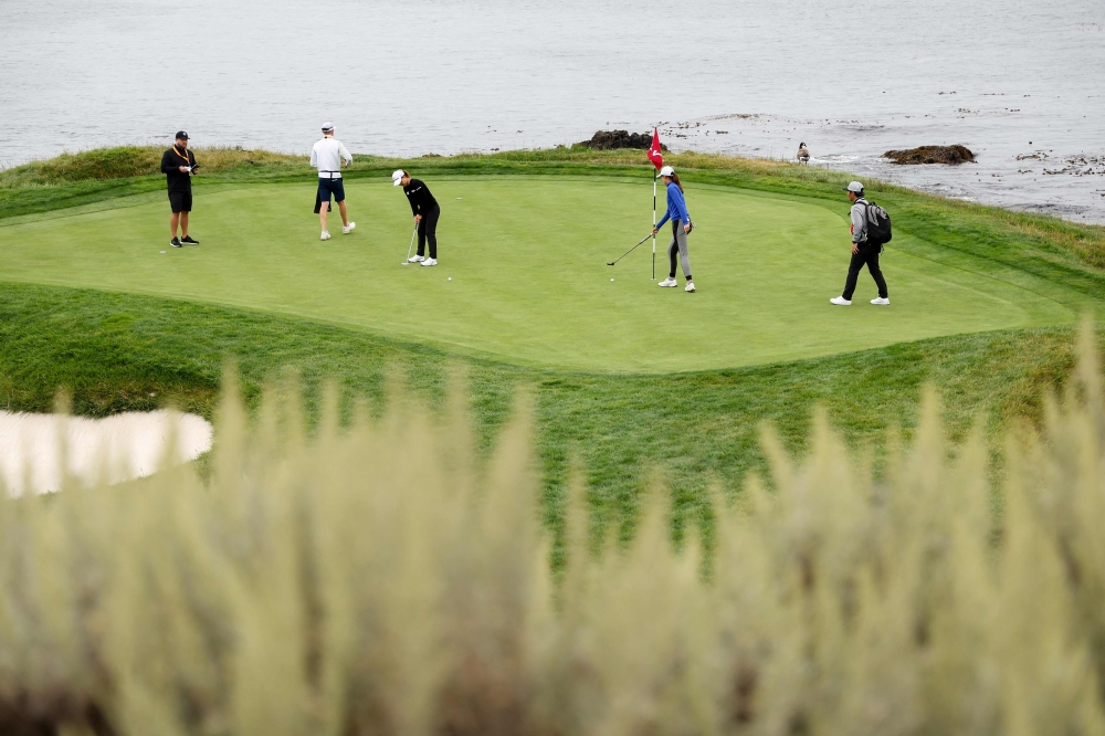 A general view is seen as Minjee Lee of Australia putts alongside her group on the seventh green prior to the 78th US Women’s Open at Pebble Beach Golf Links on July 5, 2023 in Pebble Beach, California. — Ezra Shaw/Getty Images/AFP pic