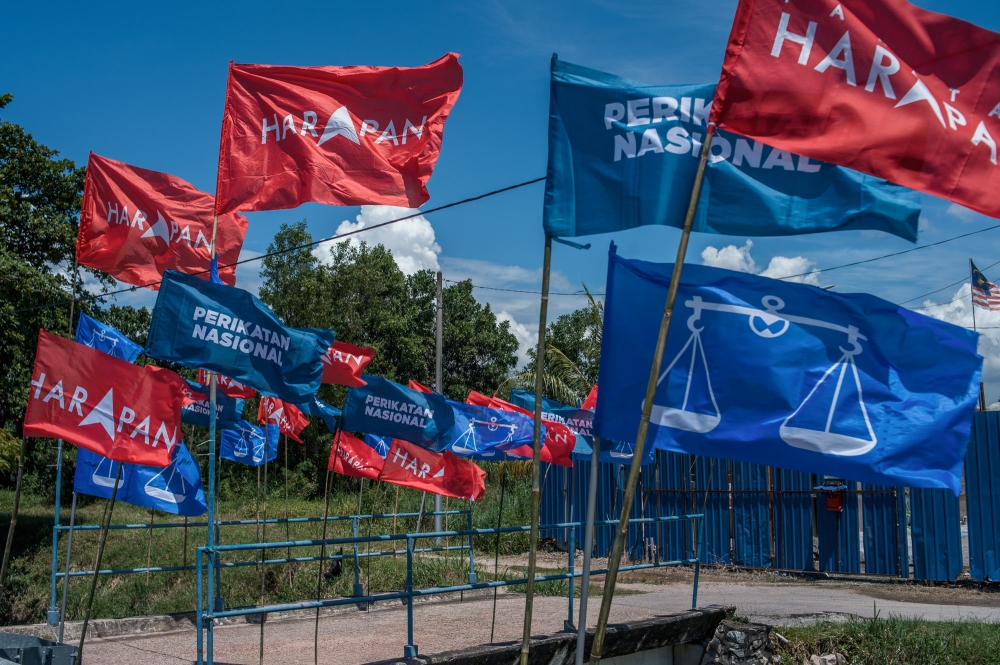 Malay voters supporting Barisan Nasional may not necessarily vote for Pakatan Harapan even though both coalitions have now banded together to fight Perikatan Nasional in the coming six state elections. ― Picture by Shafwan Zaidon