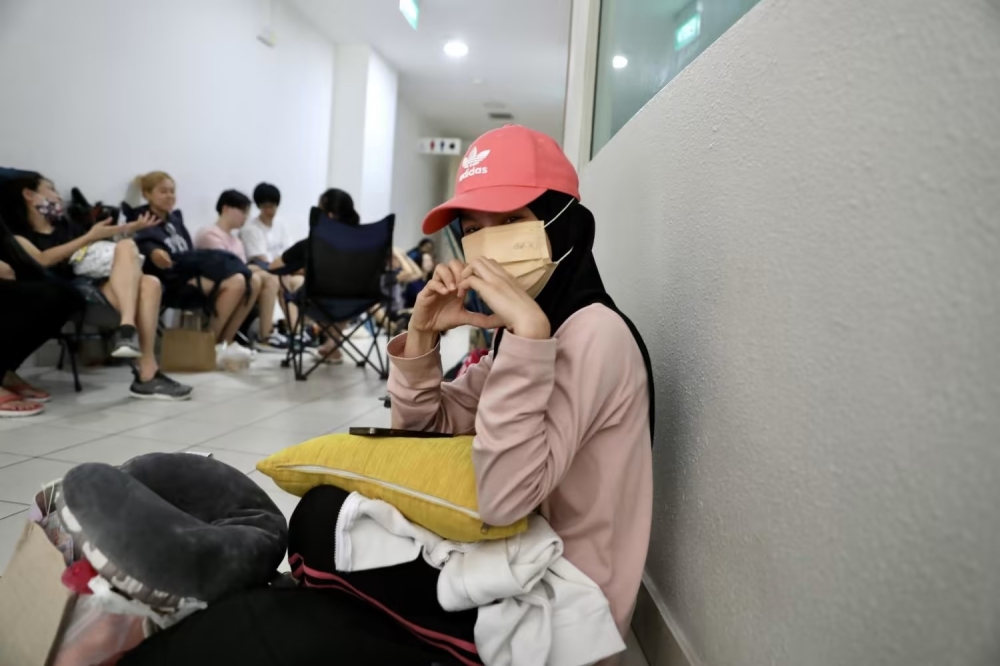 Tasha Sahidin outside the Sengkang Central post office on July 6, 2023. — TODAY pic