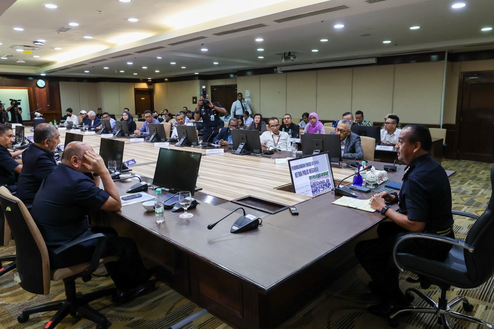 Inspector-General of Police Tan Sri Razarudin Husain (right) in a meeting with editors-in-chief of media agencies at Bukit Aman, July 6, 2023. — Bernama pic 