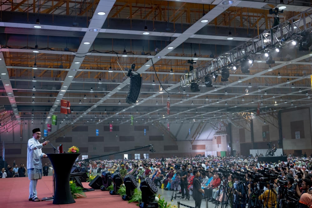 Prime Minister Datuk Seri Anwar Ibrahim delivers a speech at the Felda Settlers’ Day celebration in Serdang, July 7, 2023. — Picture from Facebook/Anwar Ibrahim 