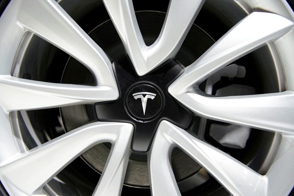 A Tesla logo is seen on a wheel rim during the media day for the Shanghai auto show in Shanghai April 16, 2019. — Reuters pic