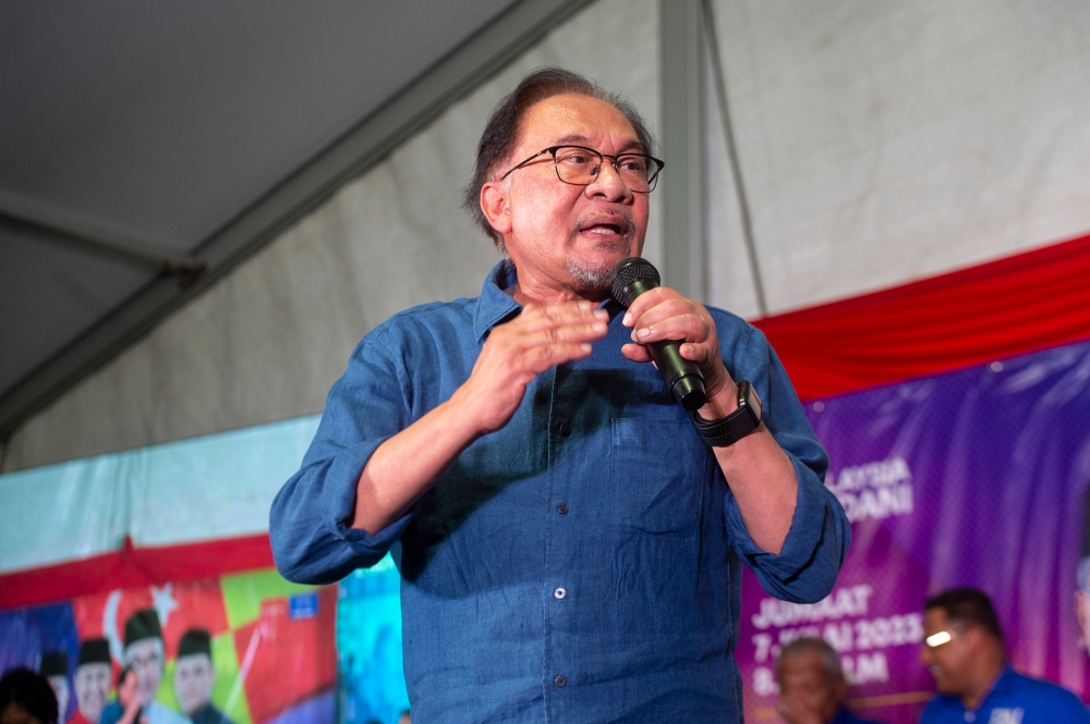 Pakatan Harapan chairman Datuk Seri Anwar Ibrahim speaks at the launch of the ‘Mega Madani Tour’ in Bangi July 7, 2023. — Picture by Shafwan Zaidon