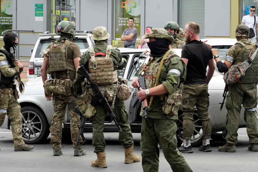 Members of Wagner in Rostov-on-Don during an attempted mutiny in late June. — AFP pic