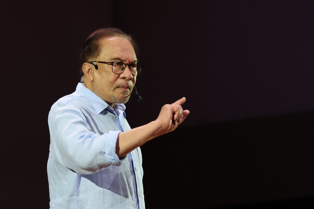 Prime Minister Datuk Seri Anwar Ibrahim speaks during a ‘Temu Anwar’ (Meet Anwar) programme at Universiti Utara Malaysia (UUM) in Sintok July 8, 2023. — Bernama pic 