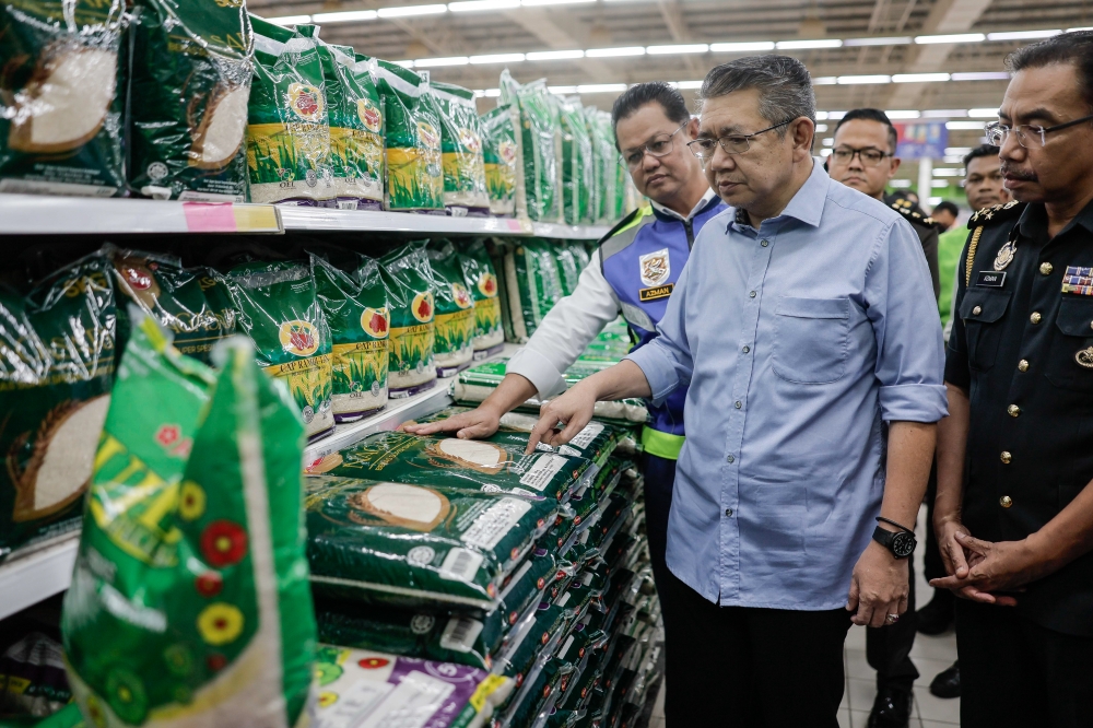 Domestic Trade and Cost of Living Minister Datuk Seri Salahuddin Ayub said the ministry will take stern action against irresponsible parties, who switch the package or label of local rice and sell it in the market as imported rice to reap a huge profit. — Bernama pic