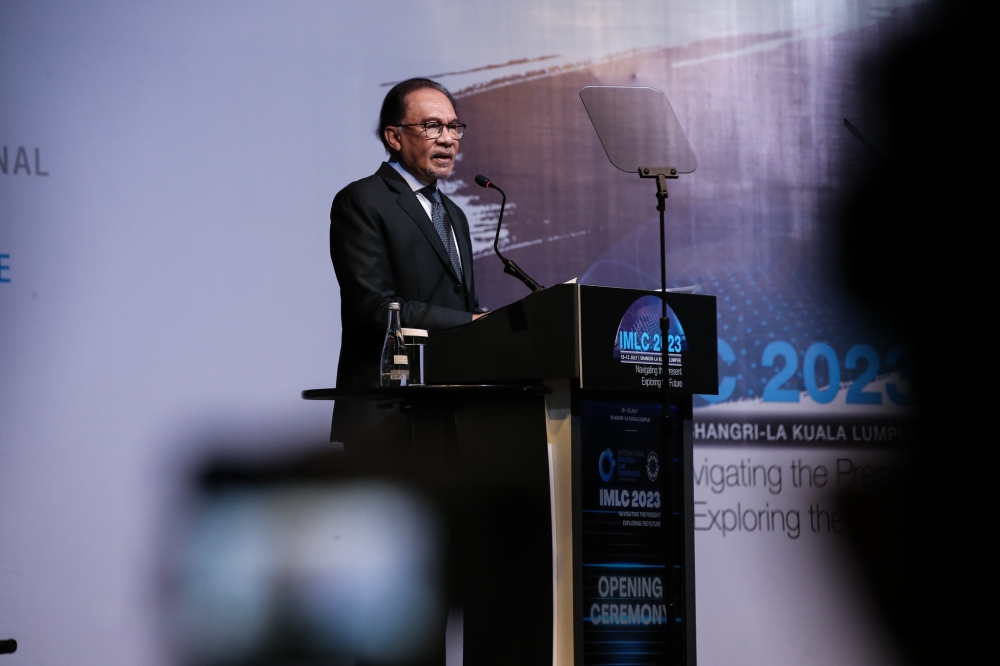 Prime Minister Datuk Seri Anwar Ibrahim delivers a speech at the International Malaysia Law Conference 2023Kuala Lumpur July 10, 2023. — Picture by Ahmad Zamzahuri