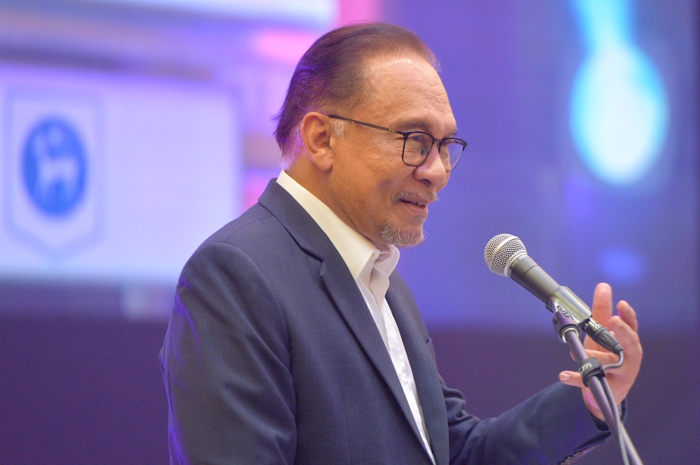 Prime Minister Datuk Seri Anwar Ibrahim delivers his speech at Lanai Kijang, Kuala Lumpur, July 11, 2023. — Picture by Shafwan Zaidon