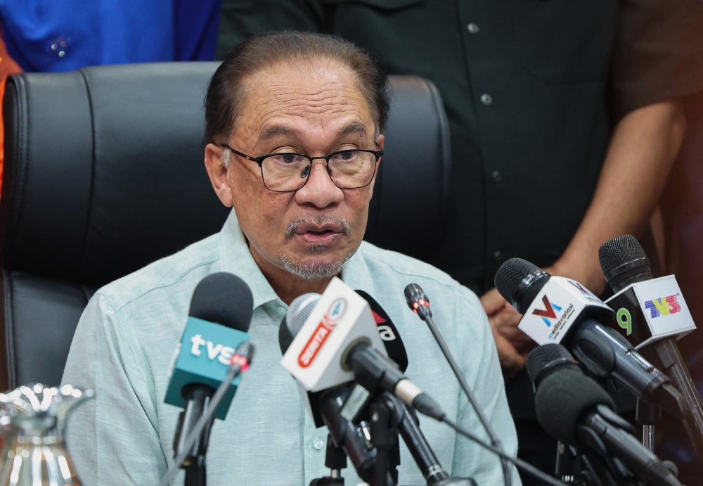 Prime minister Anwar Ibrahim speaks to reporters after chairing the Unity Government Leadership Consultative Council meeting at the World Trade Centre Kuala Lumpur July 11, 2023. — Bernama pic