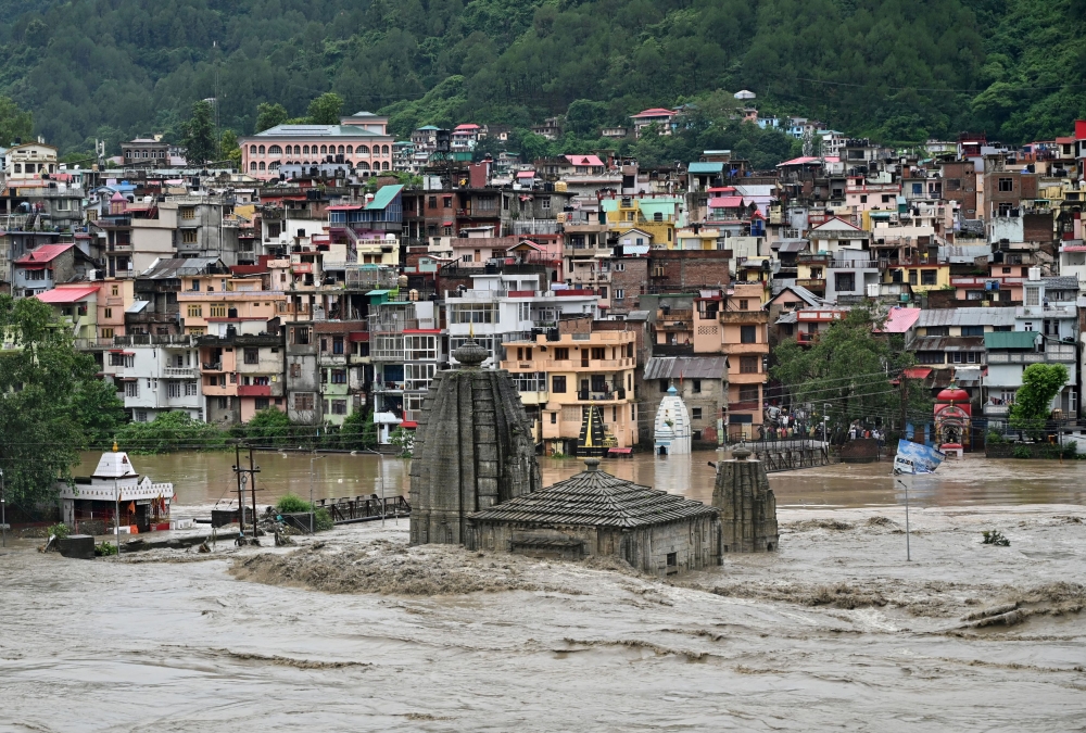 A submerged temple is pictured as the river Beas overflows following heavy rains in Mandi in the northern state of Himachal Pradesh, India, July 10, 2023. — Reuters pic