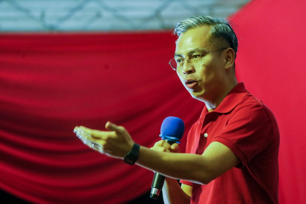 PKR communications chief Fahmi Fadzil says PN’s Datuk Seri Mohamed Azmin Ali should run against Datuk Seri Amirudin Shari in next month’s state election to see who is best suited to lead Selangor. ― Picture by Hari Anggara