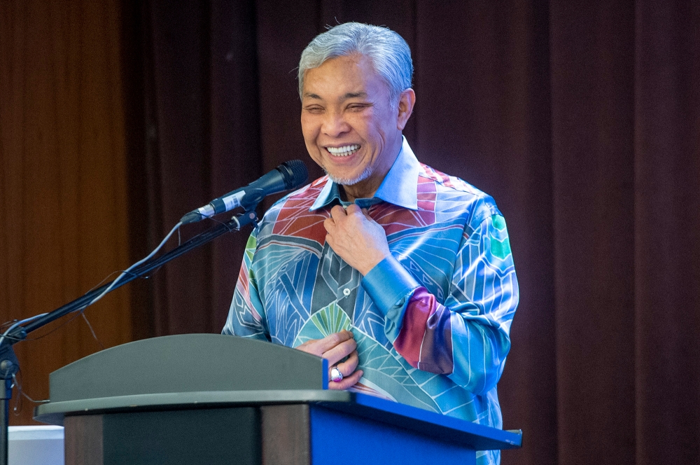 Rural and Regional Development minister, Datuk Seri Zahid Hamidi delivers his speech during the memorandum of understanding signing ceremony between Mardi and South East Johor Development Authority (Kejora) in Putrajaya 13 July 2023. — Picture by Shafwan Zaidon
