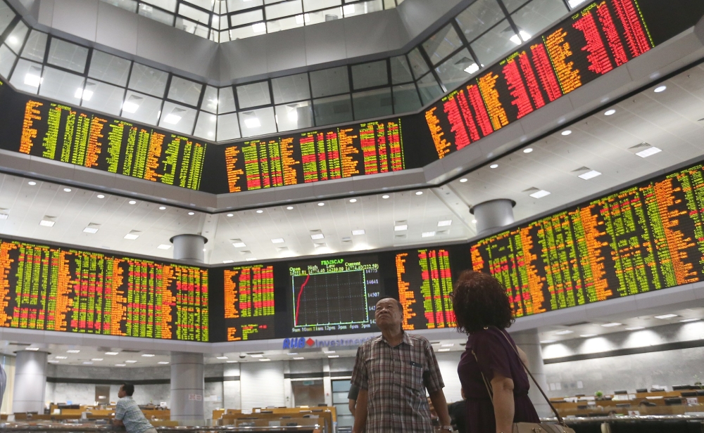 At 5 pm, the FTSE Bursa Malaysia KLCI (FBM KLCI) slipped 1.83 points, or 0.13 per cent, to 1,396.23 from 1,398.06 at Wednesday’s close. ― Picture by Razak Ghazali