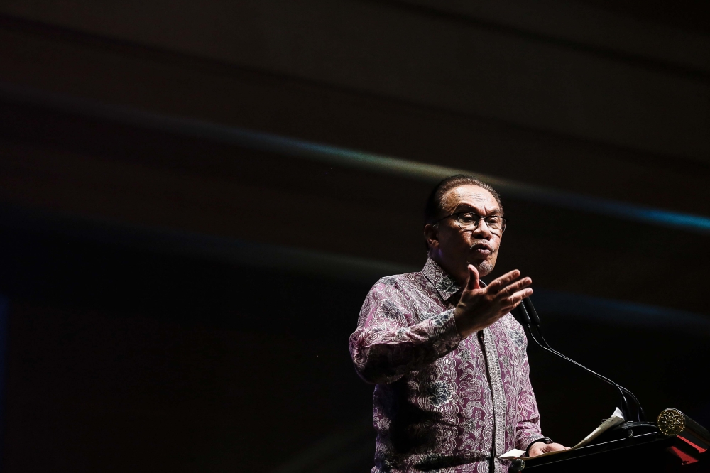 Prime Minister Datuk Seri Anwar Ibrahim delivers his speech during the Cakna Madani awareness programme with enforcement agencies at the Putrajaya International Convention Centre, July 13, 2023. — Picture by Sayuti Zainudin