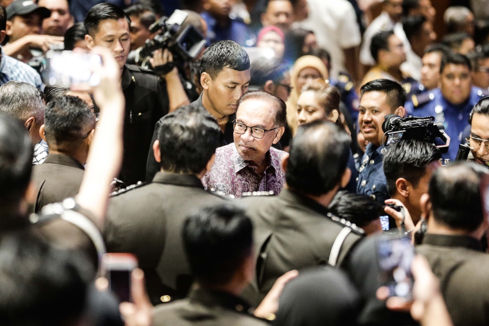 Prime Minister Datuk Seri Anwar Ibrahim meets civil servants and enforcement officers during the Cakna Madani programme at the Putrajaya International Convention Centre, July 13, 2023. — Picture by Sayuti Zainudin
