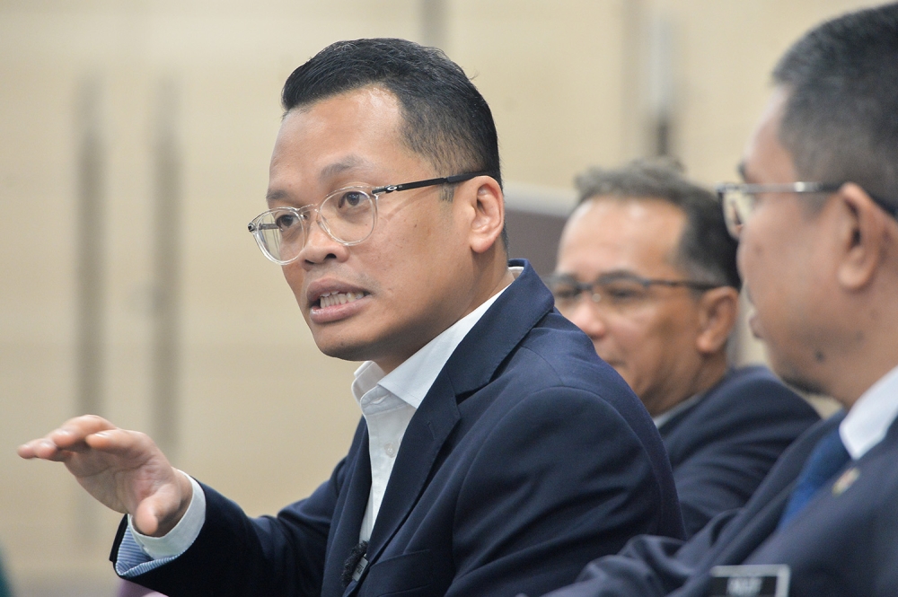 Natural Resources, Environment, and Climate Change Minister Nik Nazmi Nik Ahmad speaks during a news conference at his office in Putrajaya July 14, 2023. ― Picture by Miera Zulyana