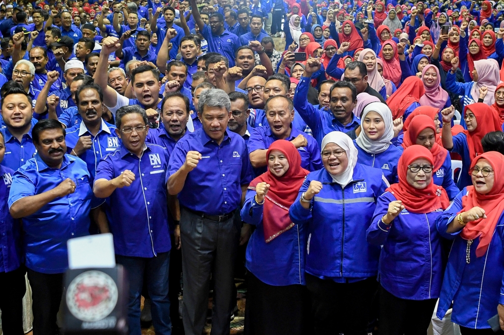 Umno deputy president Datuk Seri Mohamad Hasan (3rd left) announced that Barisan Nasional contesting 17 seats at the upcoming state elections in Negeri Sembilan. — Bernama pic