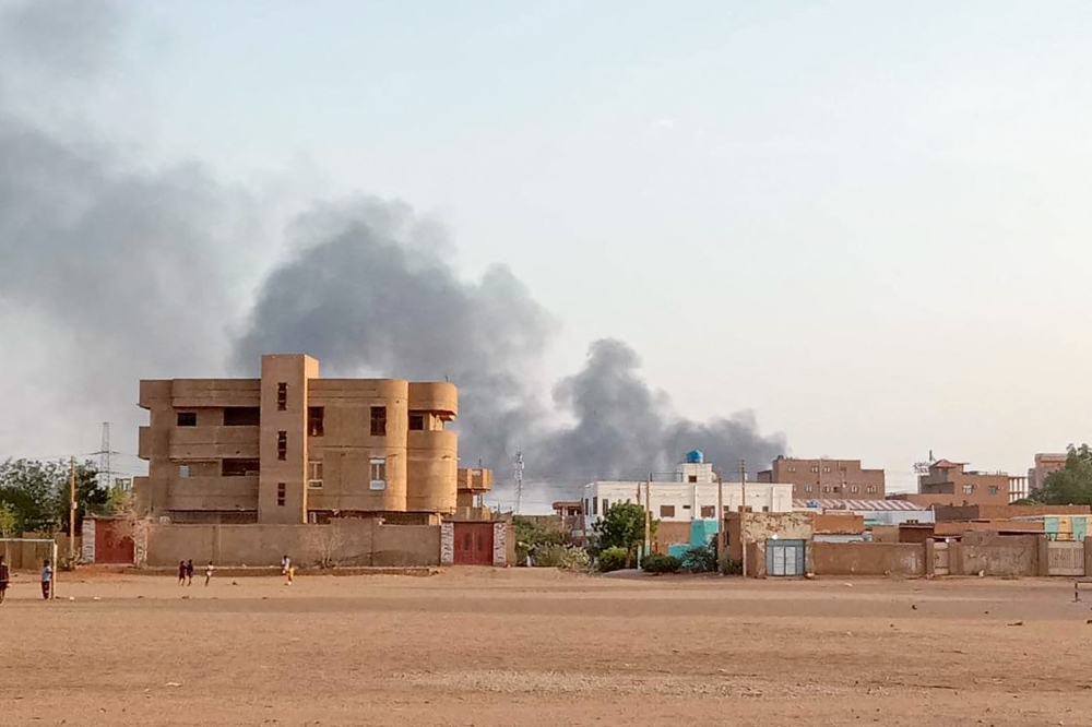 File photo of smoke billowing in the distance around the Khartoum Bahri district amid ongoing fighting on July 14, 2023. — AFP pic