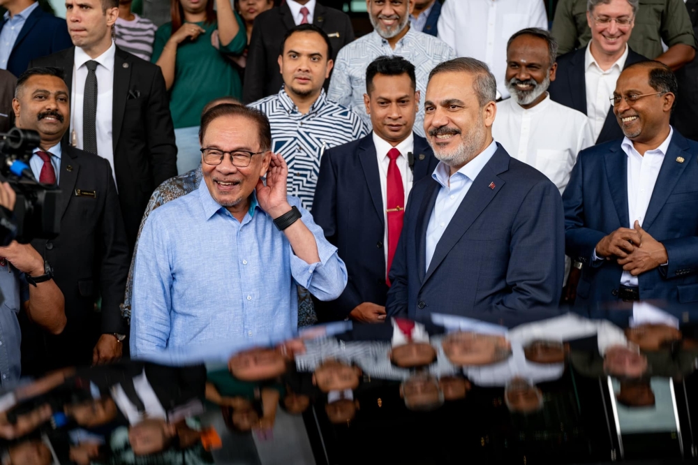 Prime Minister Datuk Seri Anwar Ibrahim today received a courtesy call from Turkish Foreign Minister Hakan Fidan, who is on a two-day official visit to Malaysia starting yesterday. — Picture courtesy of Facebook.com/AnwarIbrahimOfficial