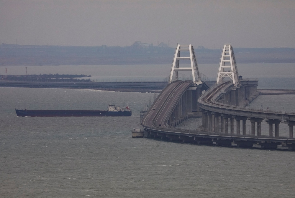 The 19-km Crimea Bridge over the Kerch Strait is the only direct link between the transport network of Russia and the Crimean peninsula. — Reuters pic