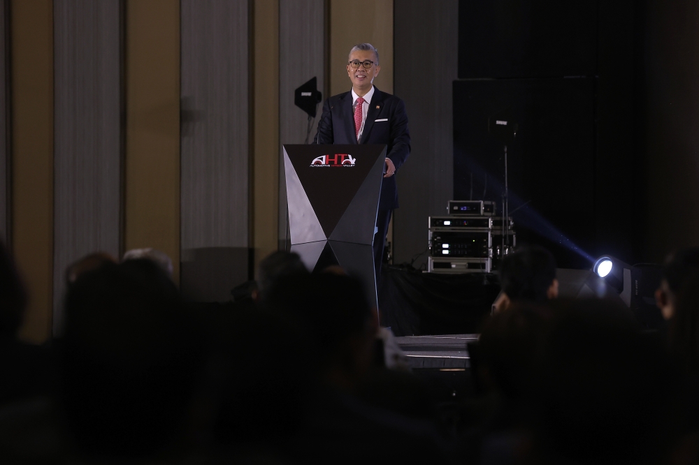 Investment, Trade and Industry Minister Datuk Seri Tengku Zafrul Abdul Aziz delivers a speech at the Proton Global Investors and Vendors Convention 2023 in Kuala Lumpur July 17, 2023. — Bernama pic