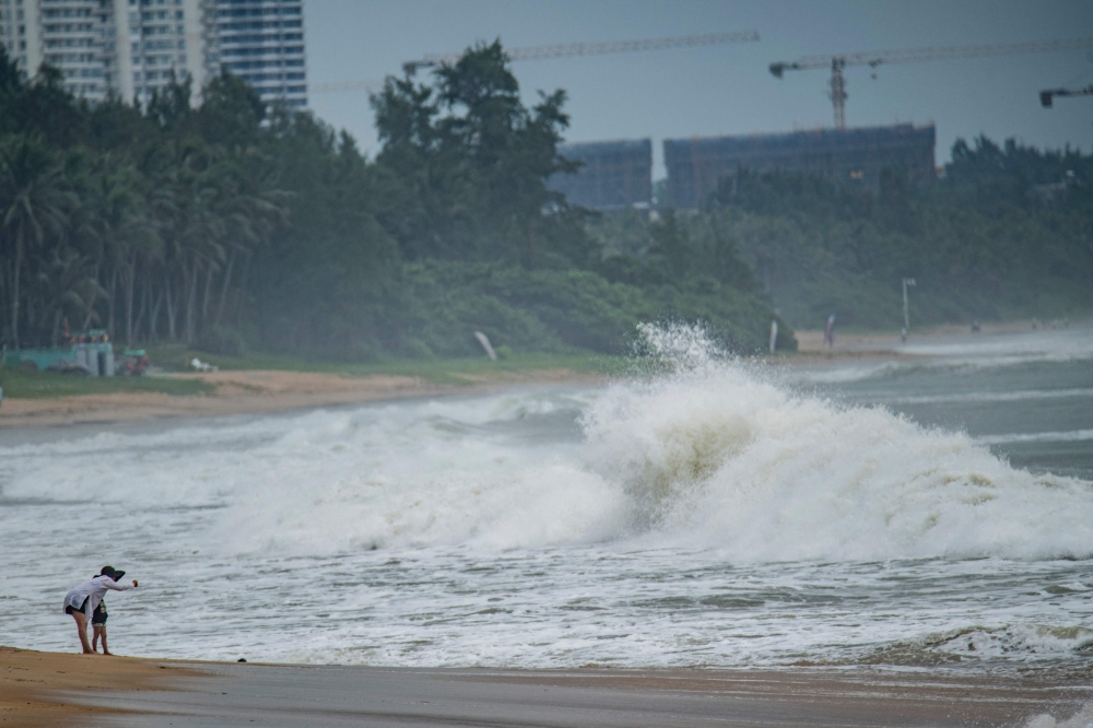 Thousands evacuated as typhoon pummels southern China, Vietnam | Malay Mail