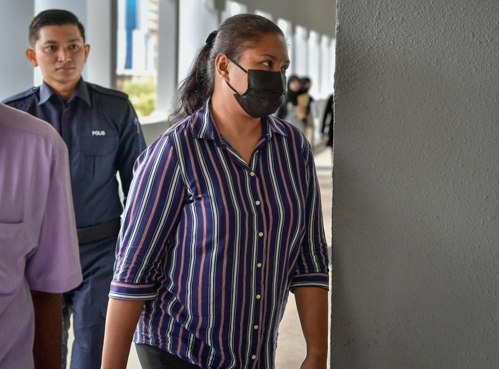Former Treasurer of Persatuan Wanita Berjaya Sejati Malaysia B. Shivaranjani, 42, (right) was fined RM3,500 by the Sessions Court today for using two fake payment vouchers for the allocation of funds under the Indian Community Transformation Unit Malaysia (Mitra) amounting to RM1,600. — Bernama pic 