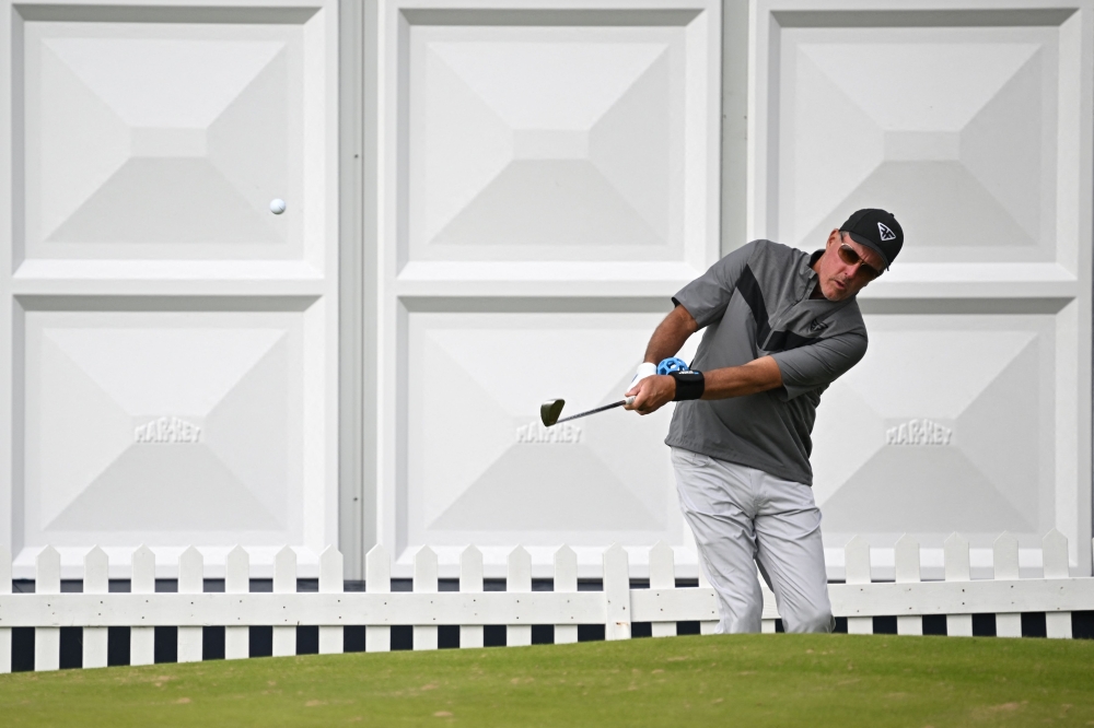 US golfer Phil Mickelson practices his chipping during practice ahead of the 151st British Open Golf Championship at Royal Liverpool Golf Course in Hoylake, north-west England on July 16, 2023. — AFP pic 