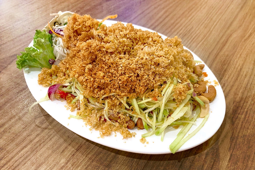 'Yum pla duk foo' or crispy catfish and green mango salad. 