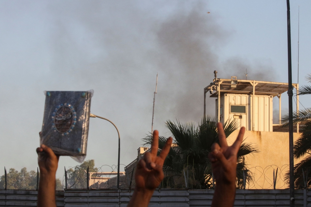 Swedish embassy in Baghdad stormed, set alight by Muslim protesters ...