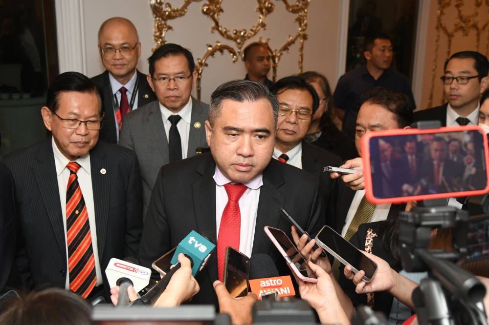 Transport Minister Anthony Loke speaks to reporters in Kuching, July 20 2023. — Picture courtesy of Sarawak Information Department.