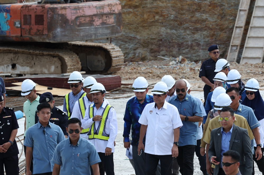Home Minister Datuk Seri Saifuddin Nasution Ismail during a visit to the Jenun Baru Water Treatment Plant near Pendang, Kedah, July 20, 2023. — Bernama pic 