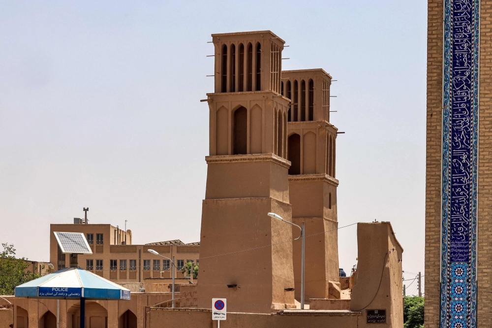 This picture taken on July 3, 2023 shows a view of wind-catchers in Iran's central city of Yazd. — AFP pic