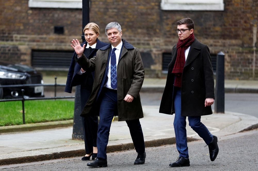 Vadym Prystaiko, who has been dismissed as Ukraine's ambassador to Britain, waves as he and his wife Inna Prystaiko walk outside Number 10 Downing Street on the first anniversary of Russia's full-scale invasion of Ukraine, in London, Britain, February 24, 2023. — Reuters pic