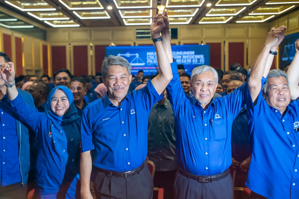 Barisan Nasional chairman Datuk Seri Zahid Hamidi and BN deputy chairman Datuk Seri Mohamad Hasan are seen as BN announces state election candidates at World Trade Centre in Kuala Lumpur July 21, 2023. — Picture by Shafwan Zaidon
