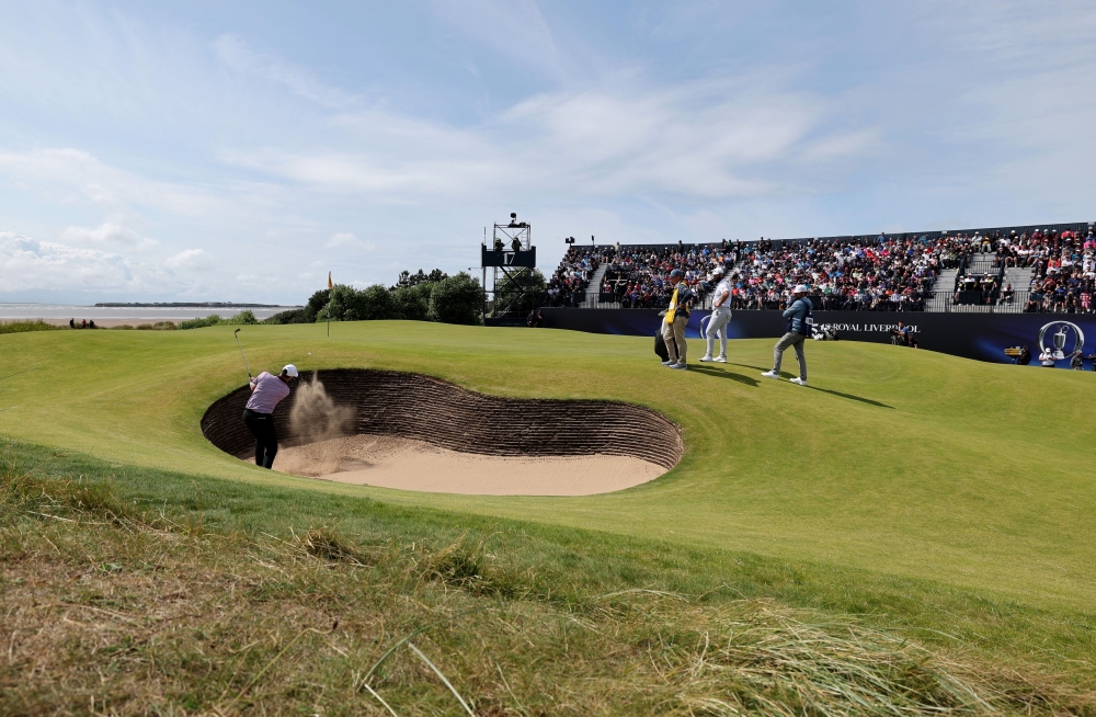 England's Justin Rose plays out of a bunker on the 17th hole during the 151st Open Championship second round at Royal Liverpool, Hoylake July 21, 2023. — Reuters pic