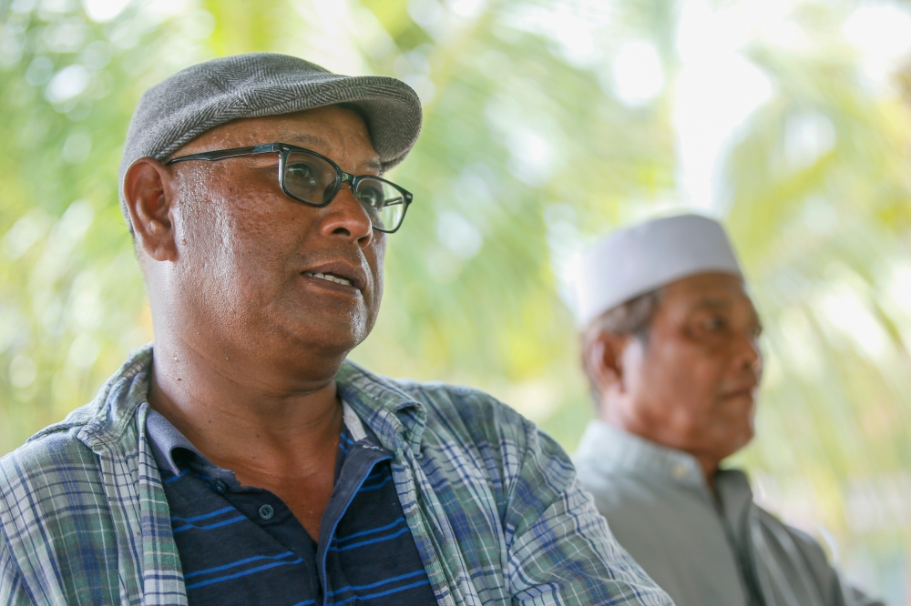 Paddy farmer community leader Aini Sanusi 53, speaks to Malay Mail during the interview in Tanjung Karang, Selangor July 11, 2023. — Picture by Hari Anggara