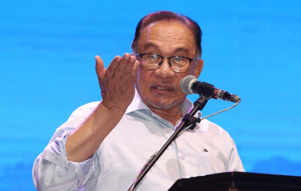 Prime Minister Datuk Seri Anwar Ibrahim delivers a speech at the Cakna Madani Programme with education services officers at the Universiti Sains Malaysia Health Campus near Kubang Kerian July 23, 2023. — Bernama pic