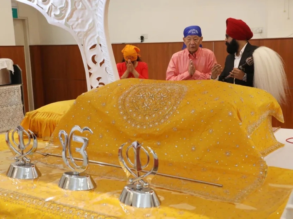 Presidential hopeful Ng Kok Song pays a visit to the Central Sikh Gurdwara at Towner Road on July 23, 2023. — TODAY pic