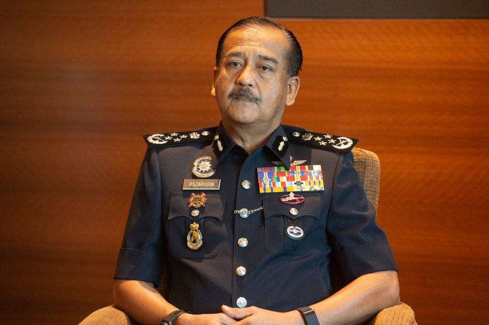 IGP Tan Sri Razarudin Husain asserted that the police responded proactively to the investigation and were determined to prevent any reckless individuals from committing such criminal acts. ― Picture by Shafwan Zaidon