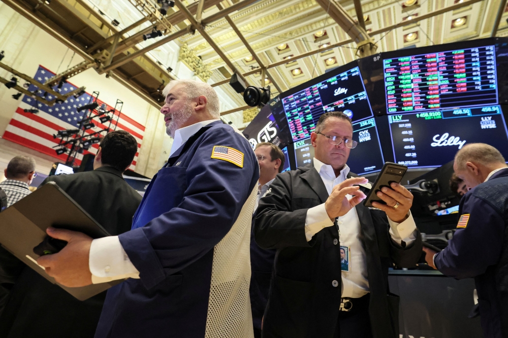 Wall Street rises ahead of Big Tech earnings, Fed decision | Malay Mail