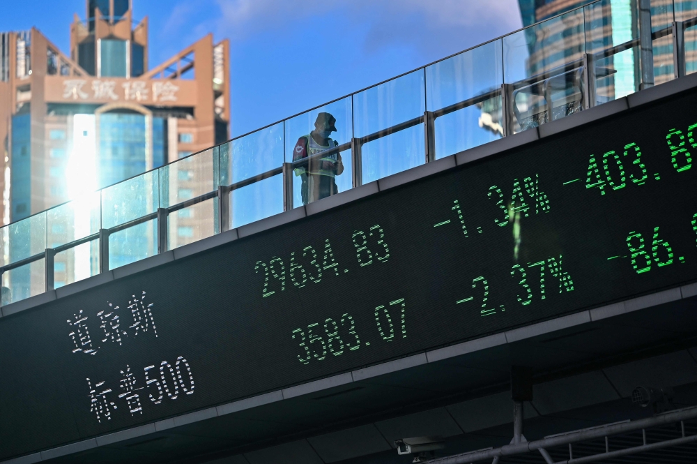 MSCI’s broadest index of Asia-Pacific shares outside Japan was 1.2 per cent higher and on course to snap a six-day losing streak. Japan’s Nikkei fell 0.22 per cent. — AFP pic