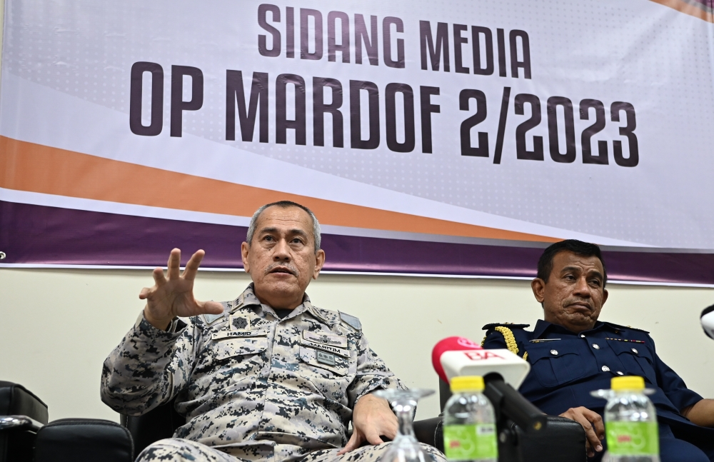 MMEA deputy director-general (operations) Maritime Vice Admiral Hamid Mohd Amin (left) said he believed the remaining four victims may still be trapped on the ship based on several indications. — Bernama pic 