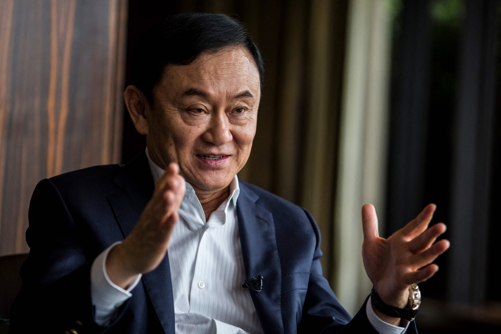 Thailand’s billionaire former prime minister Thaksin Shinawatra will return to the kingdom on August 10 after 15 years in self-exile. — AFP pic