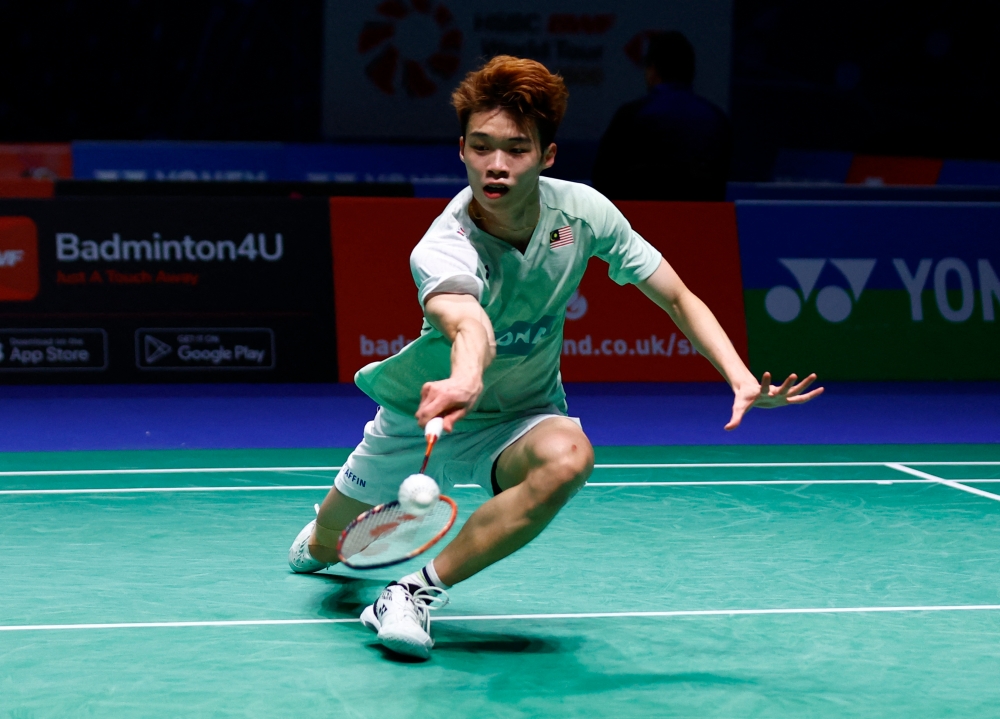 The unseeded Ng Tze Yong took 41 minutes to send Loh Kean Yew, seventh seeded, packing, 21-16, 21-17, in the tournament held in Yoyogi First Gymnasium. — Action Images via Reuters/Andrew Boyers