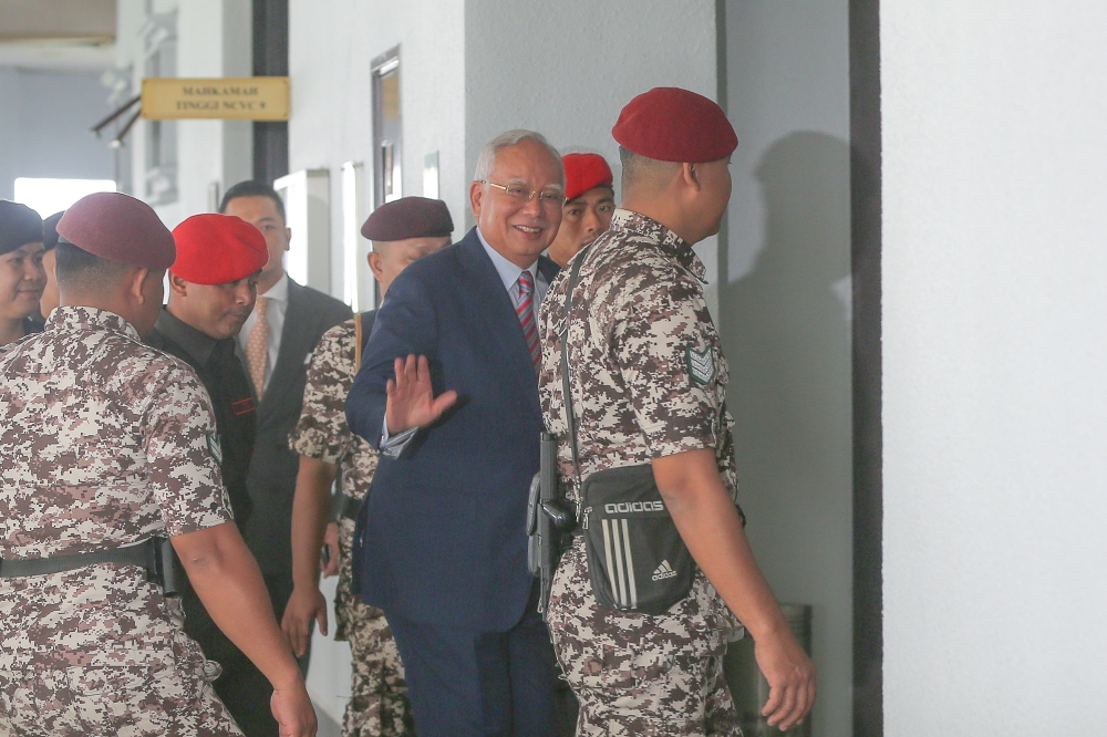 Former prime minister Datuk Seri Najib Razak arrives for the 1Malaysia Development Berhad (1MDB) trial at the Kuala Lumpur High Court, July 26, 2023. — Picture by Yusof Mat Isa