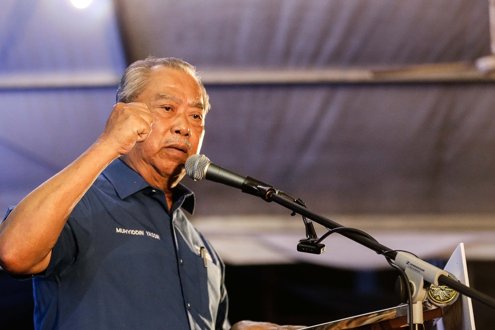 Perikatan Nasional chairman Tan Sri Muhyiddin Yassin delivers his speech before announcing candidates for the upcoming state election in Taman Medan, Petaling Jaya, July 26, 2023. —Picture by Sayuti Zainudin