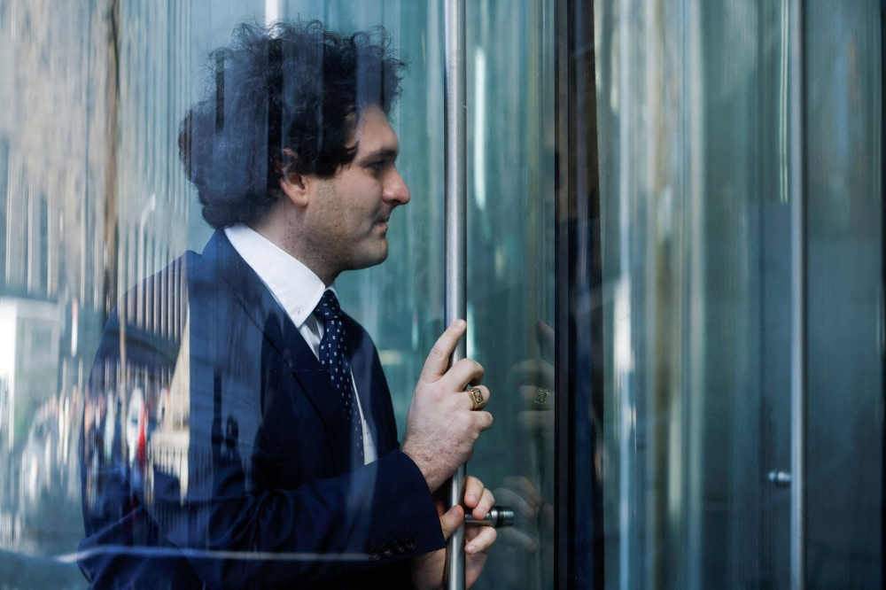 Former FTX Chief Executive Sam Bankman-Fried, who faces fraud charges over the collapse of the bankrupt cryptocurrency exchange, arrives at the Manhattan federal court in New York March 30, 2023. ― Reuters pic