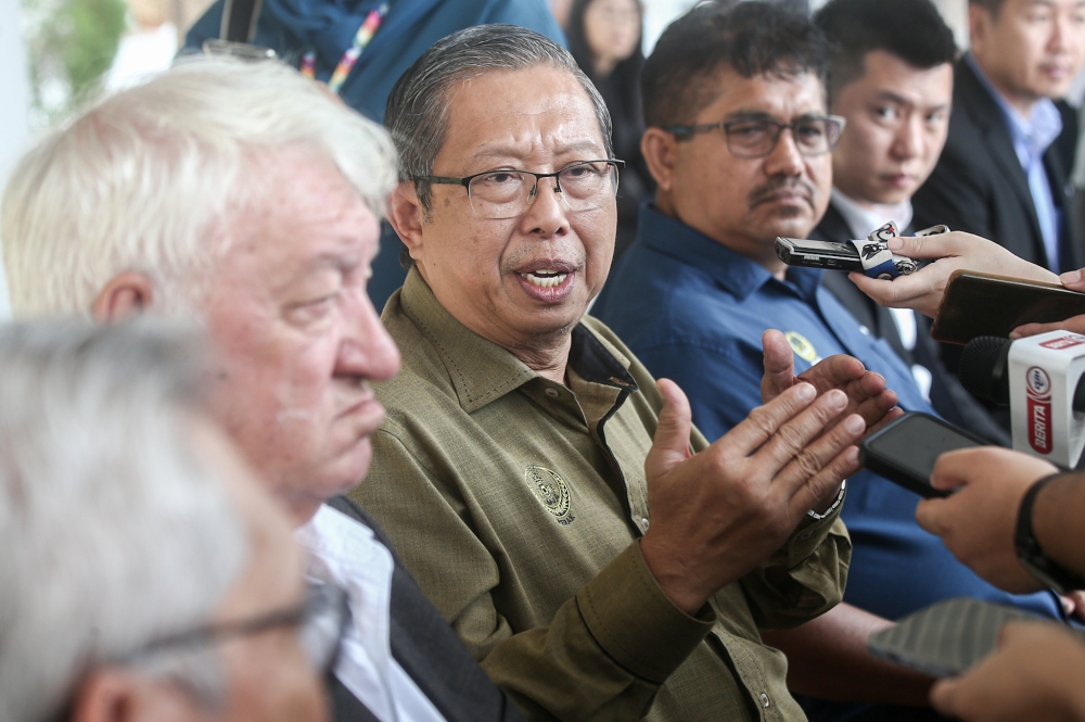 Perak Infrastructure, Energy, Water and Public Transport Committee chairman, Datuk Seri Mohammad Nizar Jamaluddin speaking to the press on the suggested new international airport project in Seri Iskandar at the Perak Tengah Land and Mines department in Seri Iskandar, Perak. — Picture by Farhan Najib
