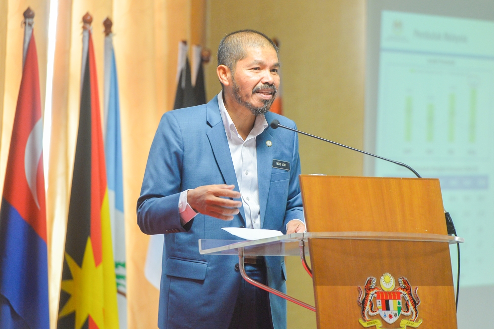 Department of Statistics Malaysia chief statistician Datuk Seri Mohd Uzir Mahidin delivers his speech during the Household Income and Expenditure Survey Findings 2022 announcement at Department of Statistics Malaysia in Putrajaya July 28, 2023. — Picture by Shafwan Zaidon